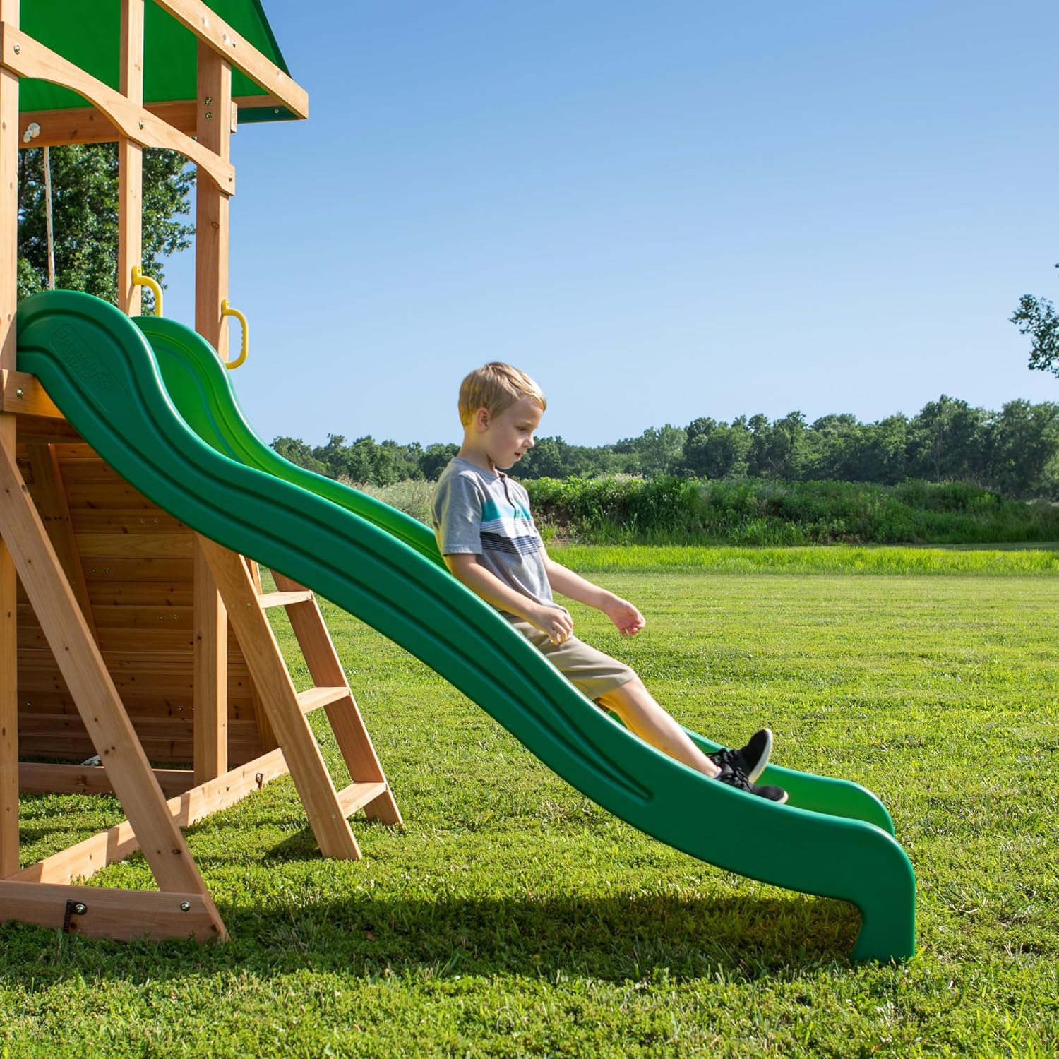 Backyard Discovery Mount Mckinley Cedar Wood Swing Set with Wave Slide, Play Deck, Double Rock Wall, Rope Ladder, Web Swing, Belt Swings, Toy Telescope, Steering Wheel, Sandbox Area, Outdoor Playset